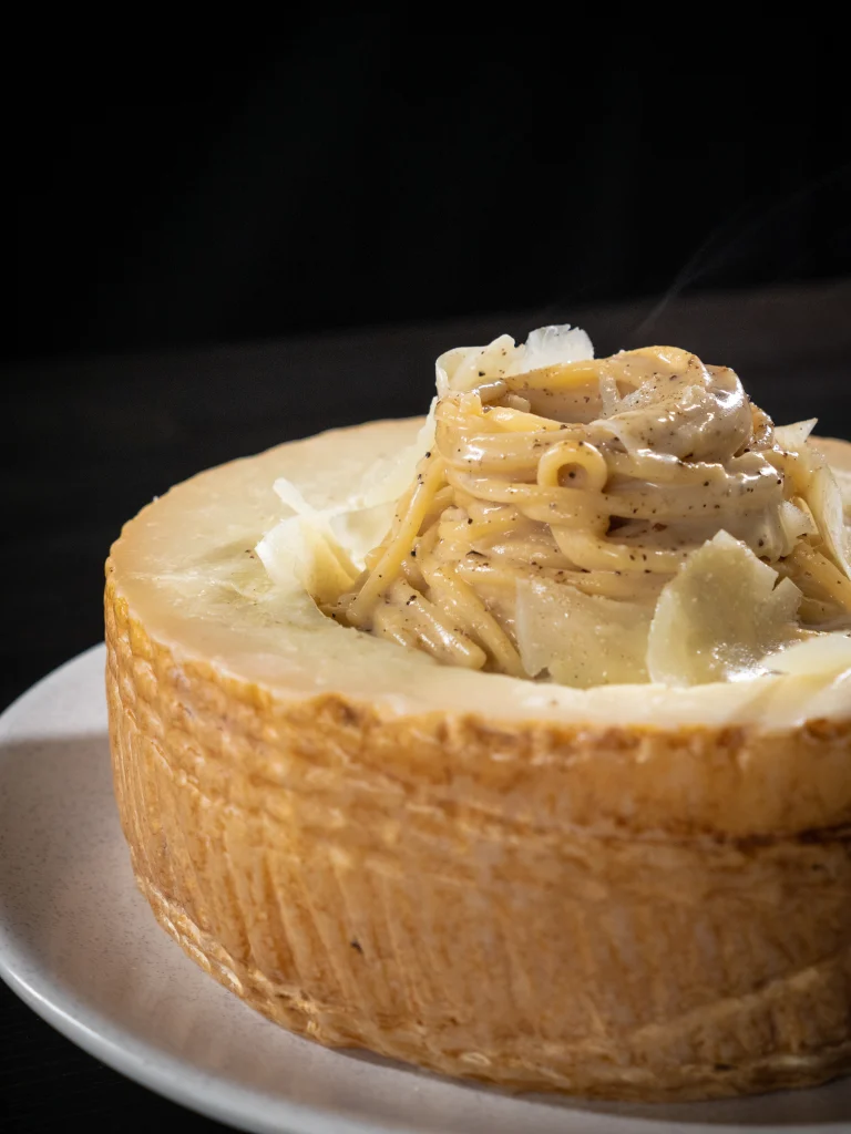 Chef Michele preparing food at a private event