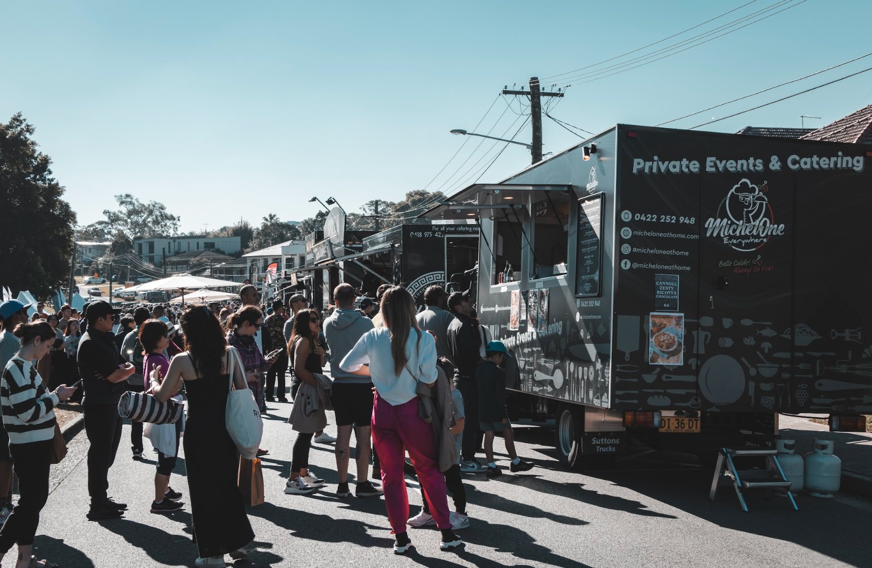 Food truck event — crowd enjoying Italian street food