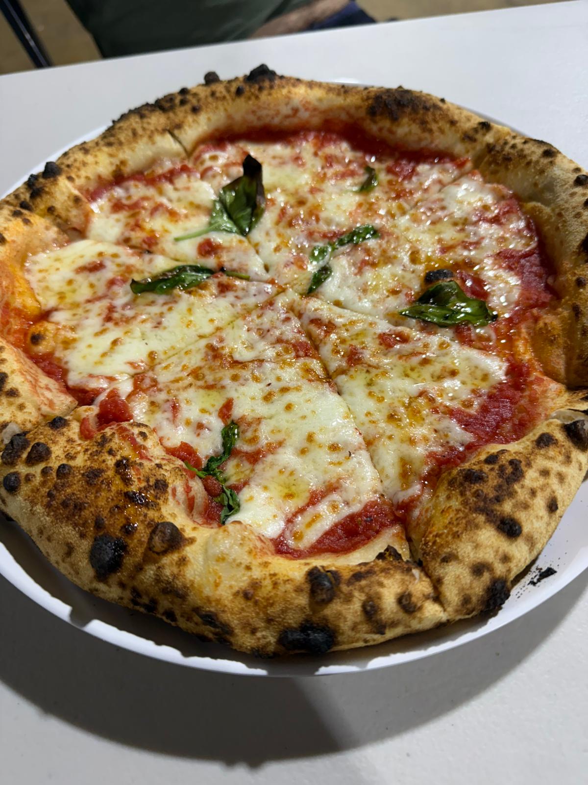 Pizza margherita — wood-fired Italian catering
